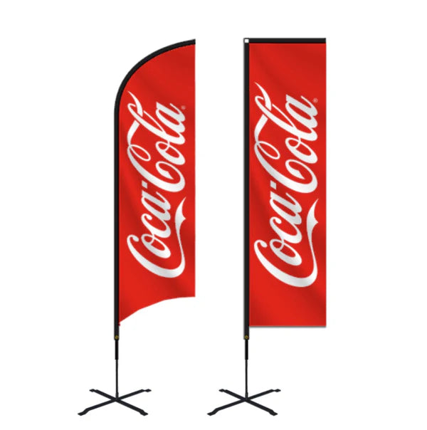 Two Coca-Cola branded flags on stands against a white background